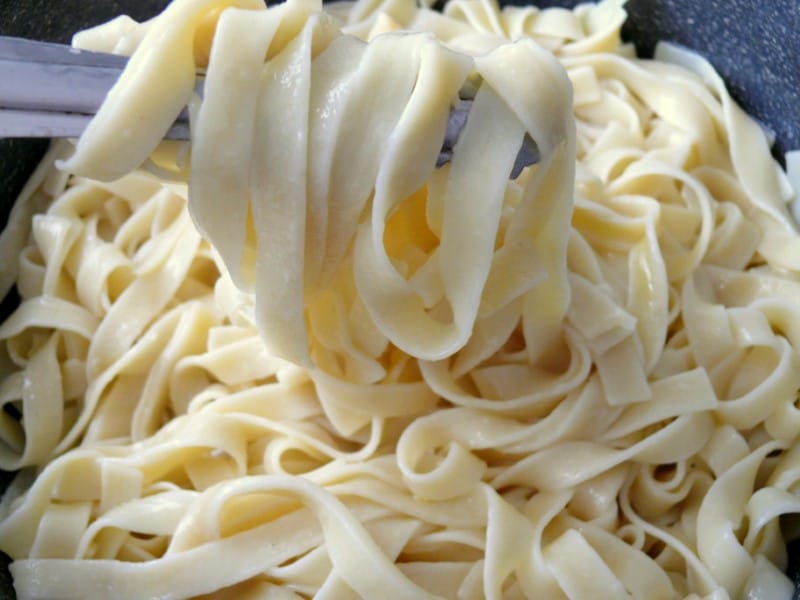 pasta tossed in the cheese sauce