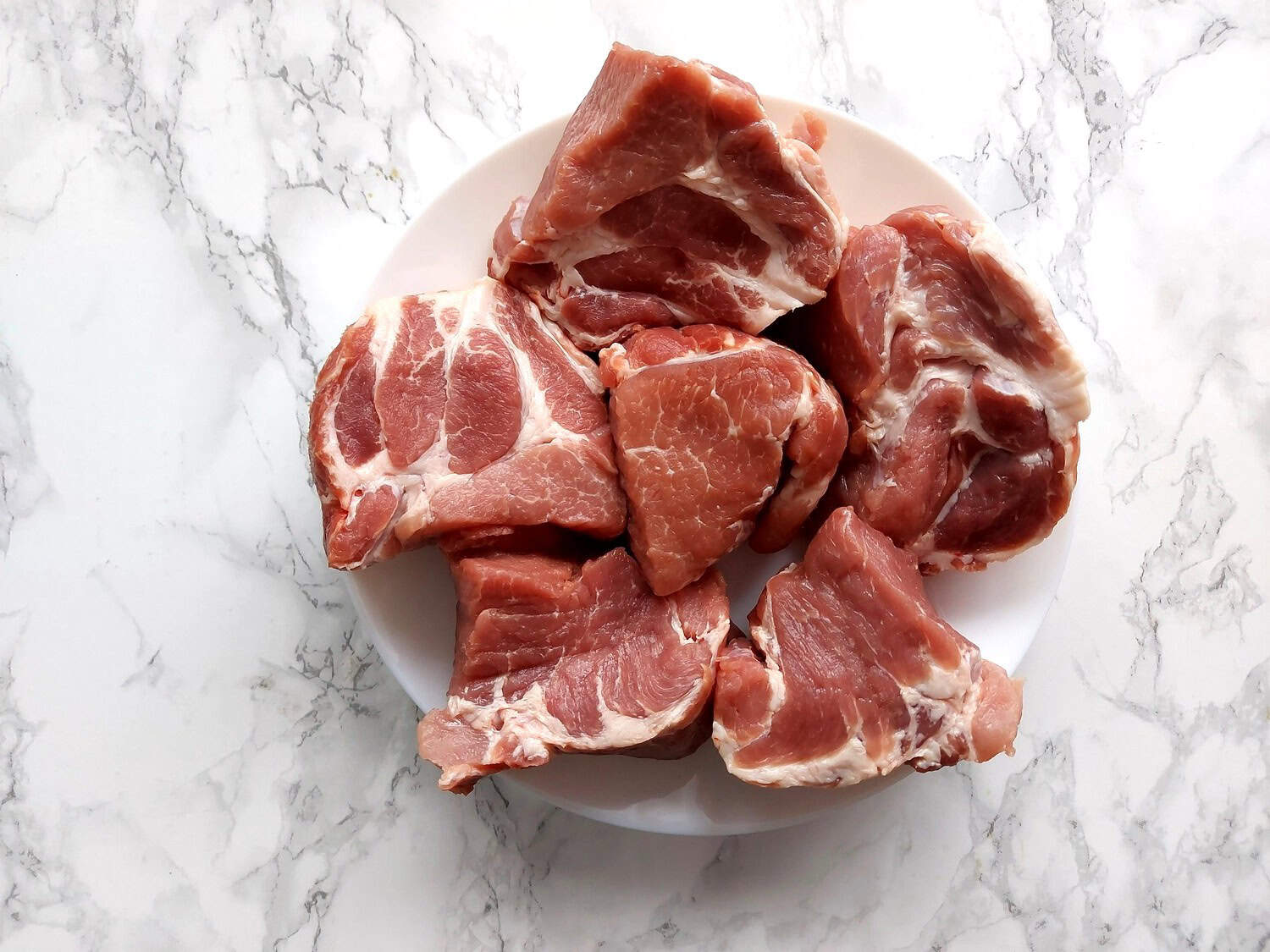 Pork meat cut into pieces