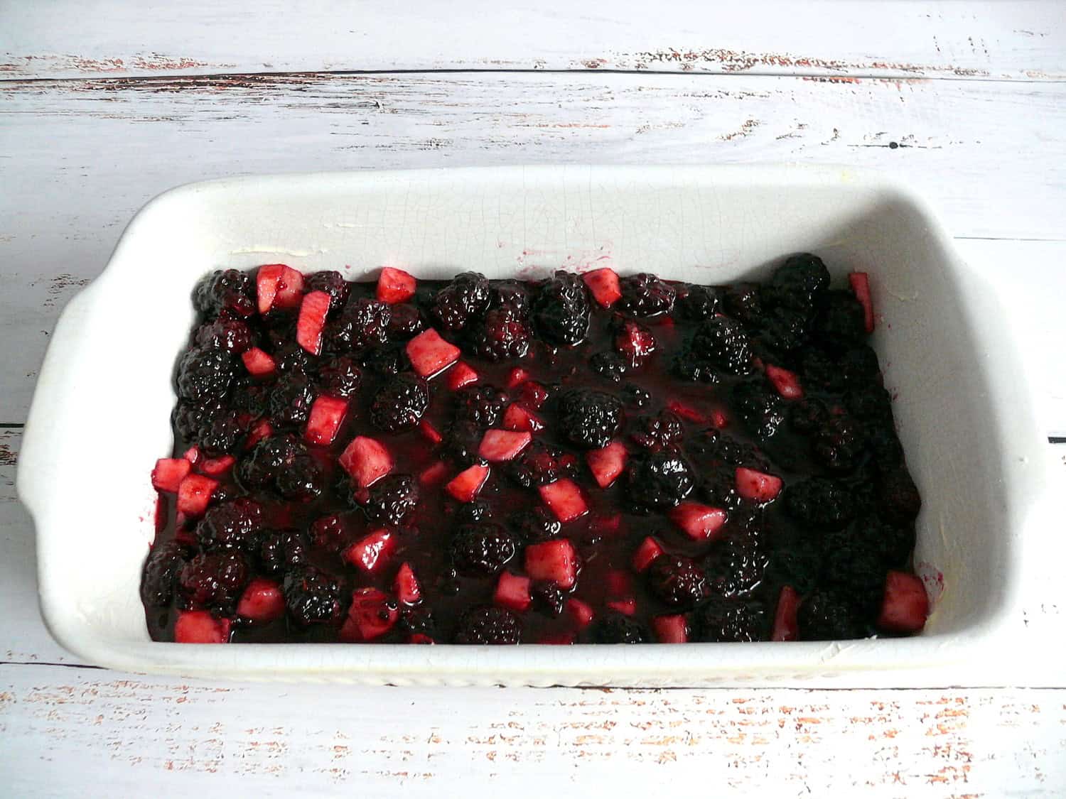 Blackberry Cobbler in a white ceramic tray