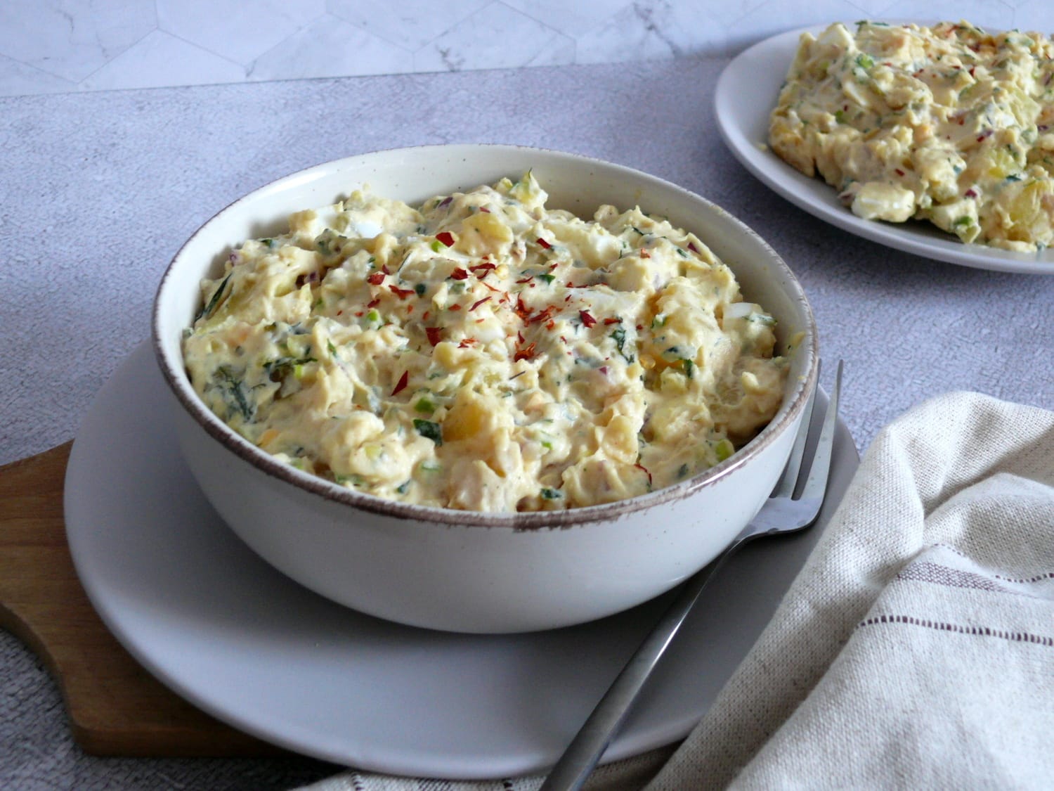 Two bowls with potato salad