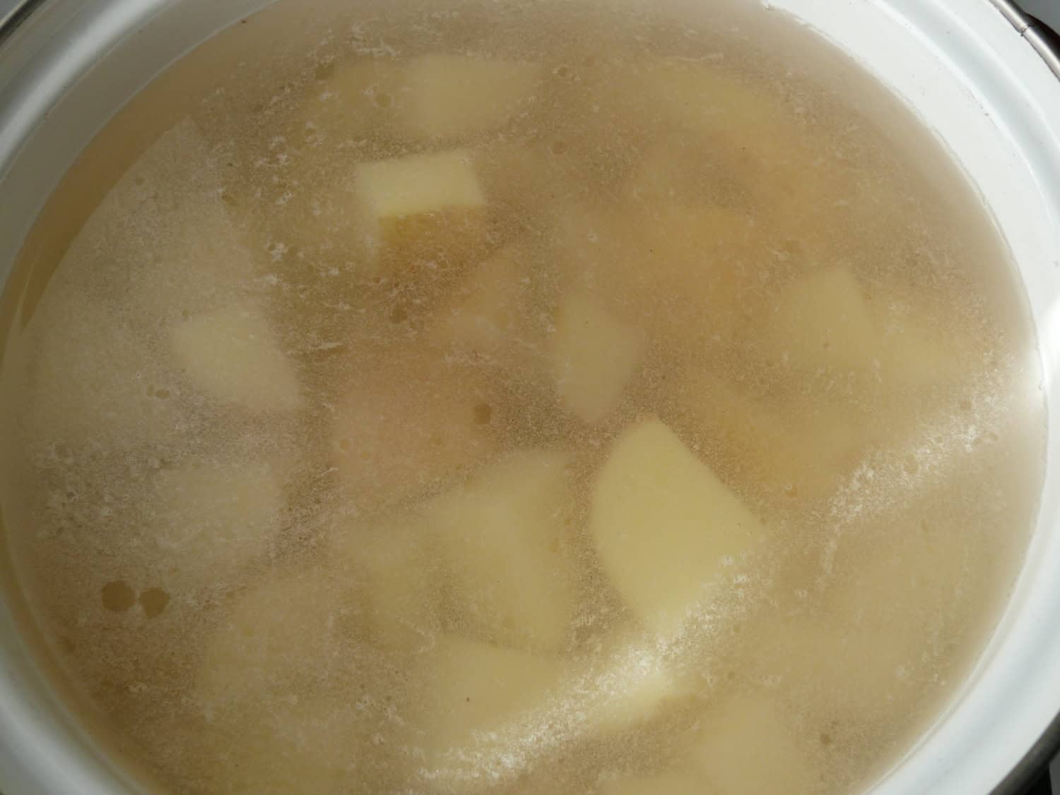 BOILING POTATOES IN SALTY WATER