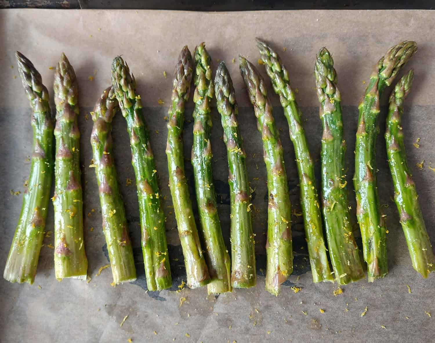 Asparagus spears tossed with olive oil, butter, lemon juice and lemon zest