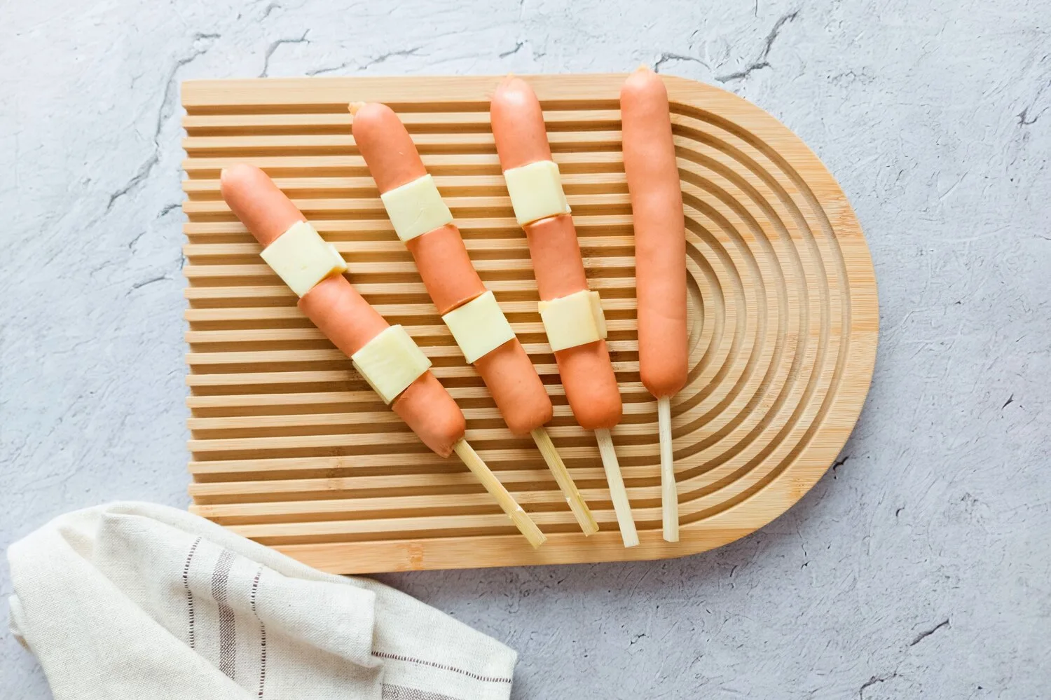 SKEWERED CORN DOGS WITH CHEESE