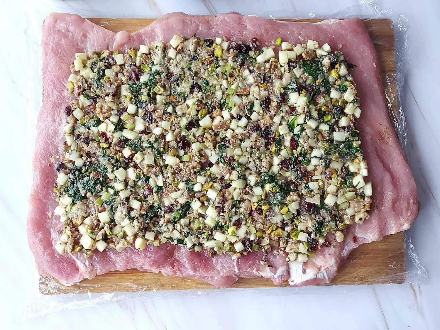 cranberry apple stuffed pork loin Stuffing mix spread all over the butterflied pork loin