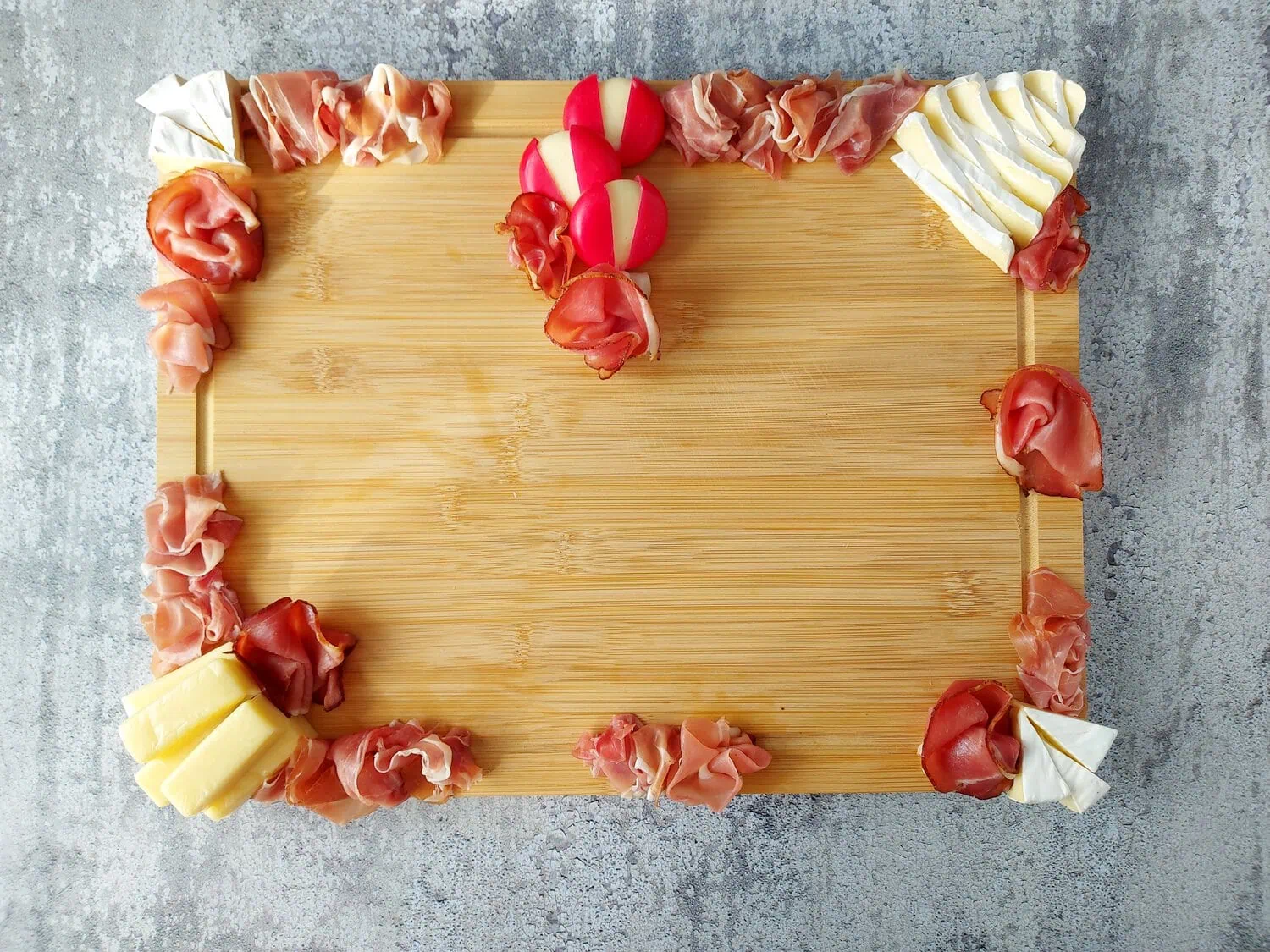 valentine's day charcuterie romantic charcuterie board with cheeses, prosciutto and salami