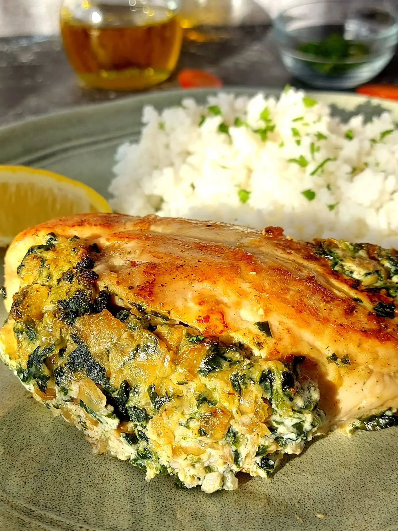 chicken and ricotta with rice on a green plate