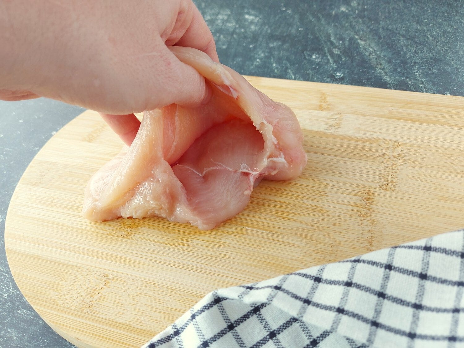 Making a pocket into the chicken breast 