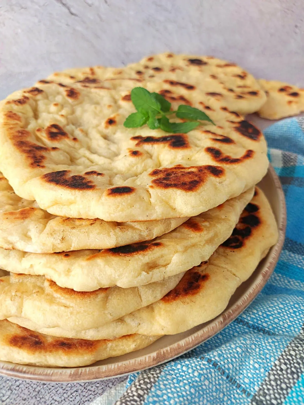 a stack of greek style pita bread