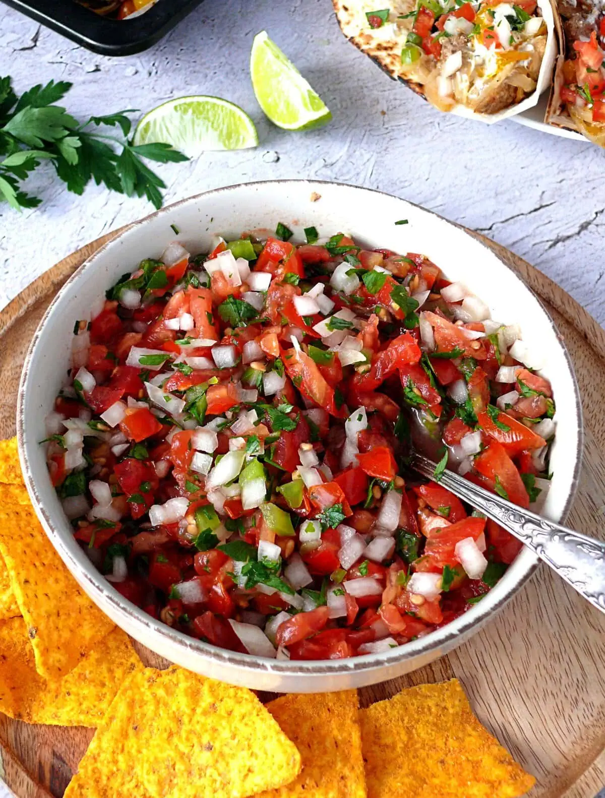 fresh pico de gallo recipe FRESH PICO DE GALLO CLOSE-UP SERVED WITH CHIOS AND CHICKEN FAJITA