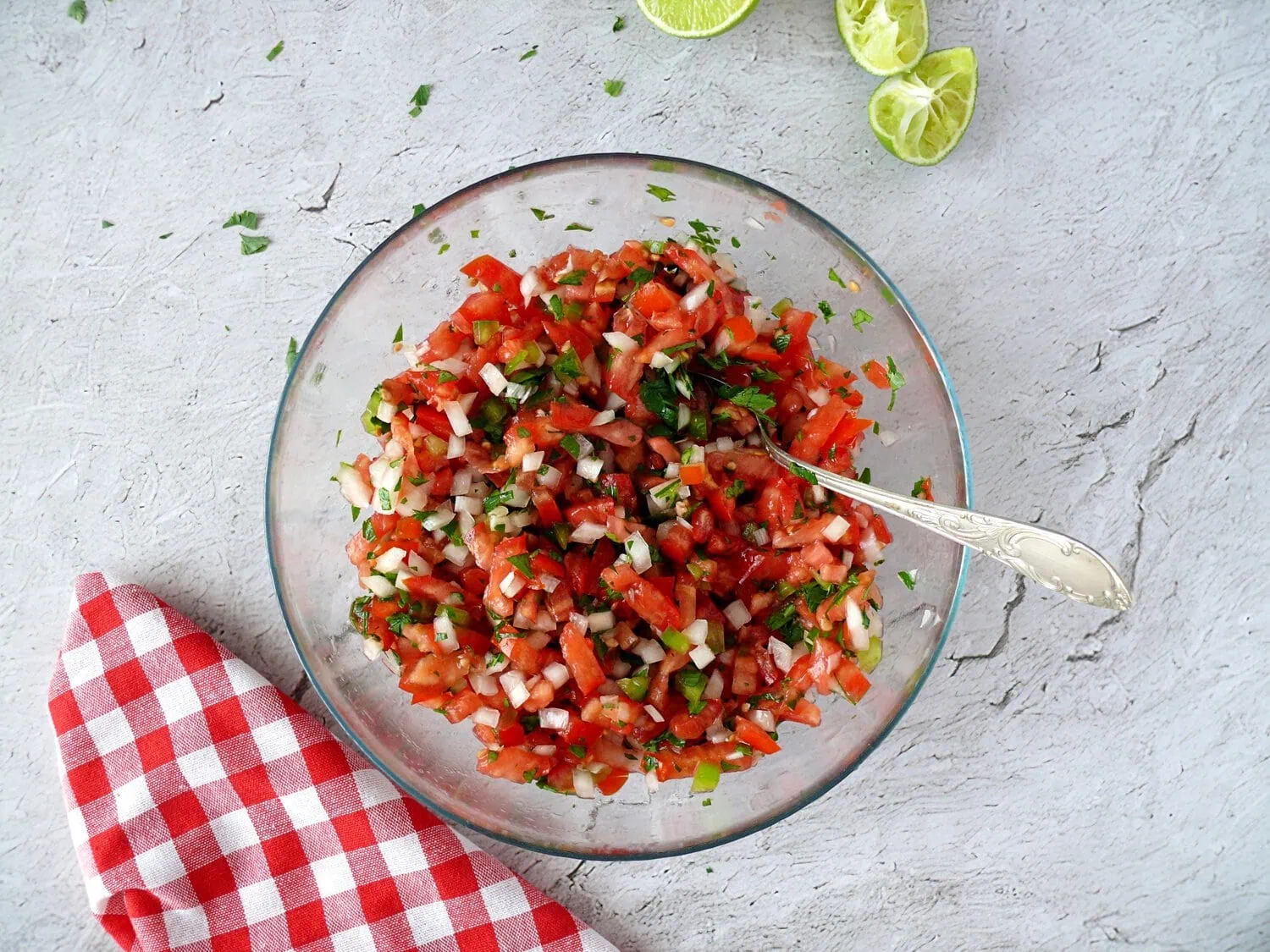 fresh pico de gallo recipe all the diced veggies mixed in a large glass bowl