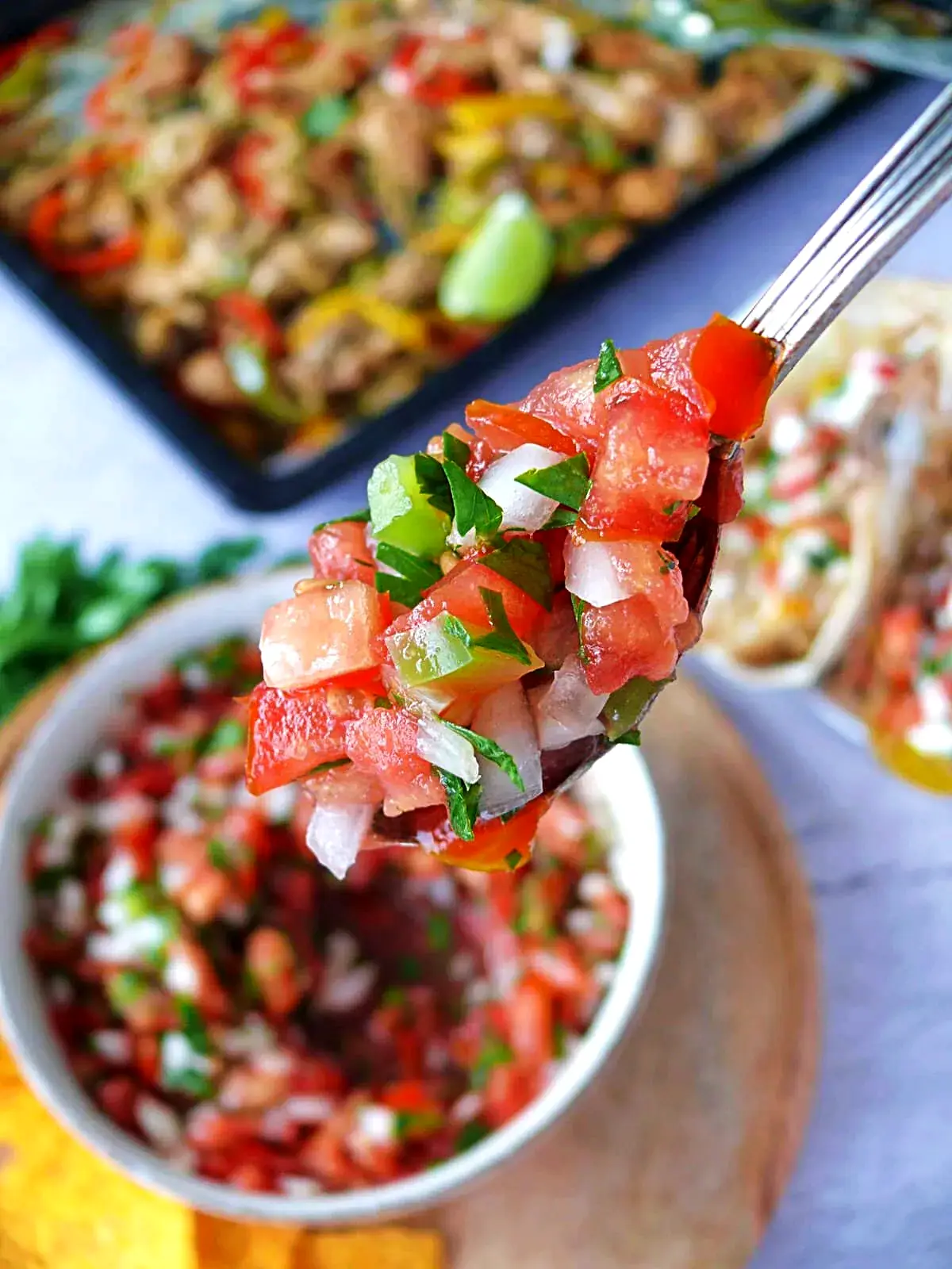 fresh pico de gallo recipe spoonful with fresh pico de gallo