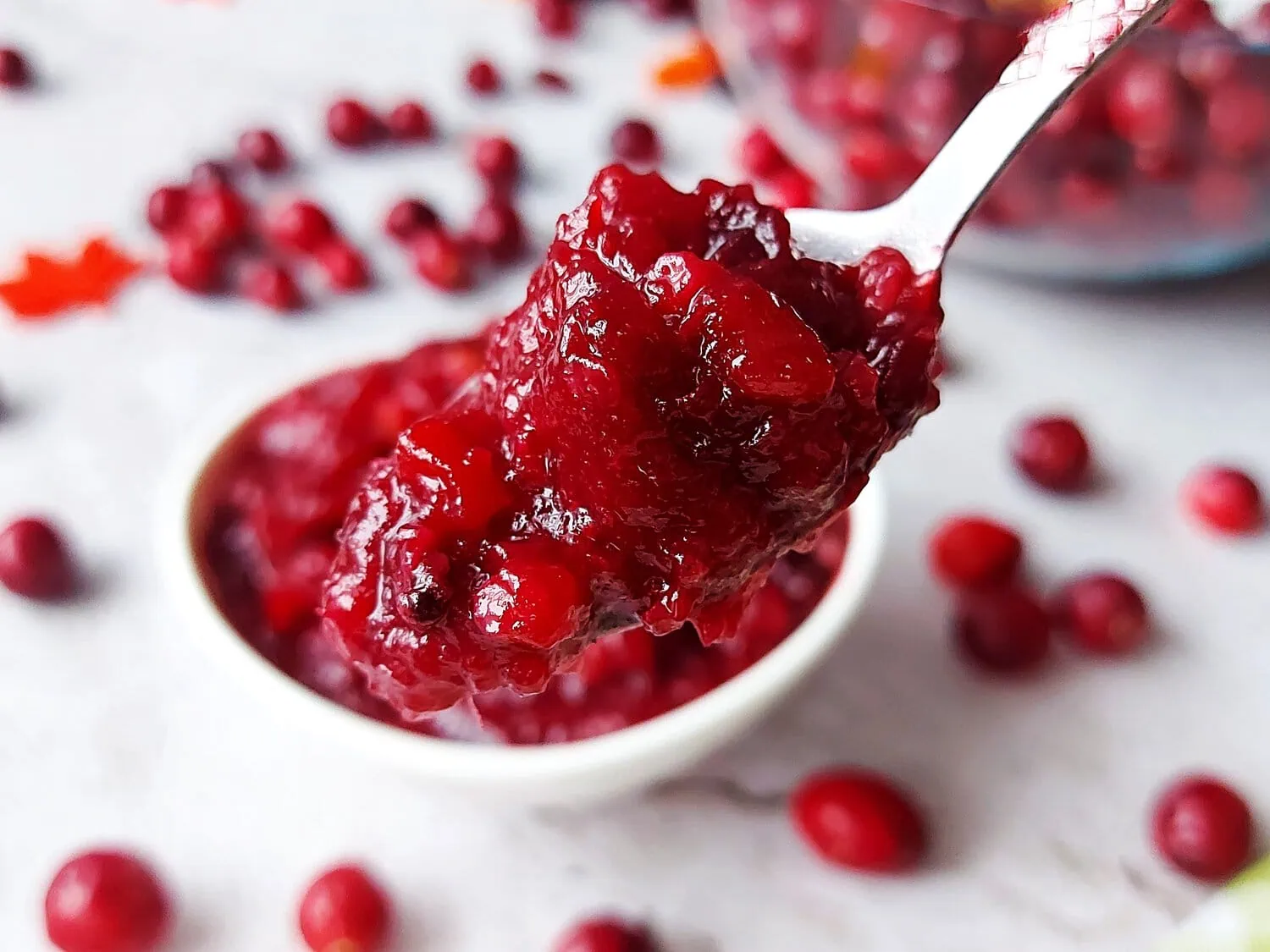 homemade cranberry sauce with orange juice A spoonful of orange cranberry sauce