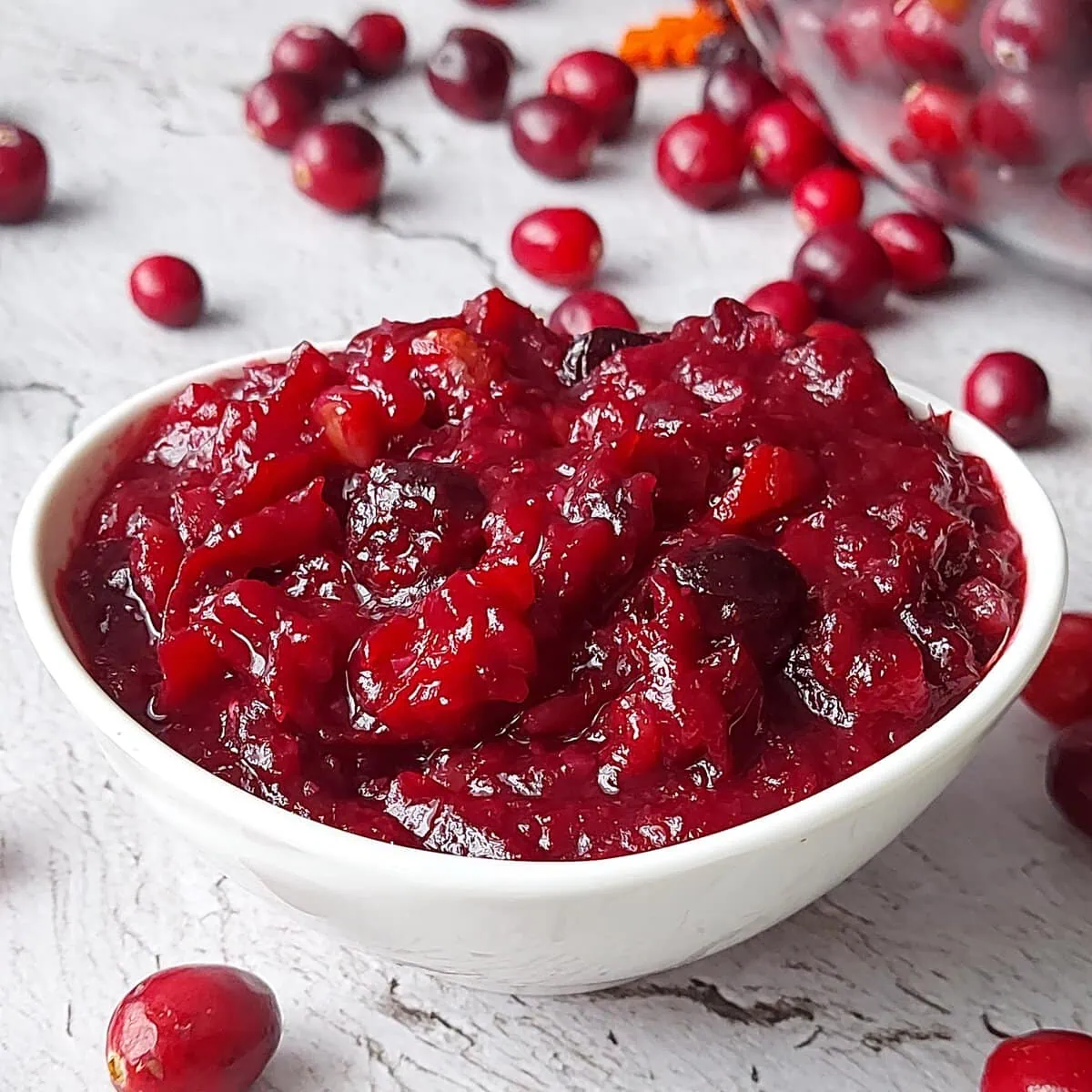 homemade cranberry sauce with orange juice Cranberry sauce made with orange juice in a white ramekin