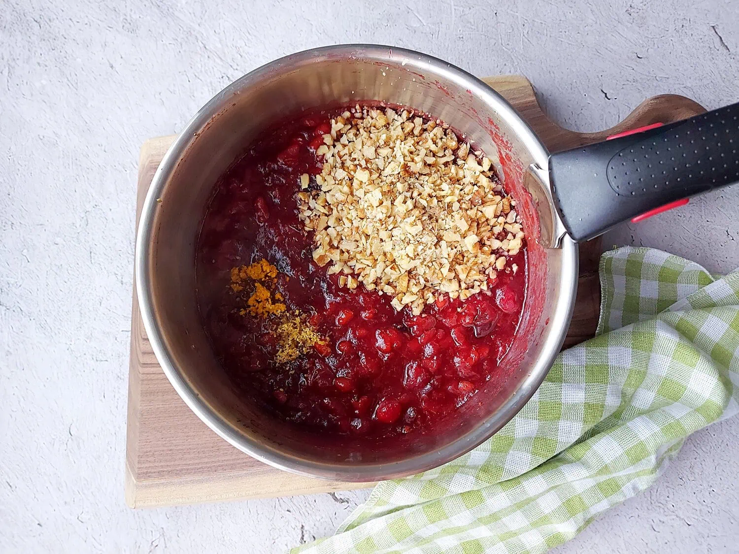 homemade cranberry sauce with orange juice Fresh cranberry sauce with orange juice, chopped walnuts, lemon zest and orange zest